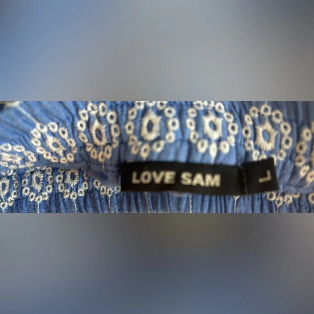 Love Sam Blue and White Embroidered Shorts fully lined in size large.